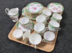 Thirty eight pieces of J & G Meakin Old English bone china tea service and an Aynsley Pembroke milk