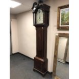 A George III mahogany eight day longcase clock with painted dial indistinctly signed, height 228 cm.