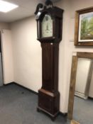 A George III mahogany eight day longcase clock with painted dial indistinctly signed, height 228 cm.