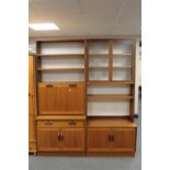 A mid twentieth century G plan teak twin section display unit