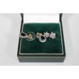 A pair of 9ct gold and diamond and sapphire earrings in a box,
