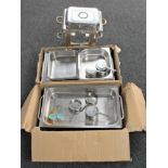 Two stainless steel chafing dishes with burners, one missing lid,