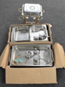 Two stainless steel chafing dishes with burners, one missing lid,