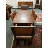 An early 20th century refectory dining table (length 152 cm) together with set of six studded