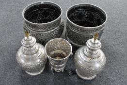 A pair of Indian style metal table lamps together with two metal planters and an ice bucket