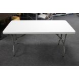 A plastic banqueting table