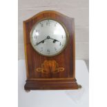 An early 20th century inlaid mahogany French mantel clock CONDITION REPORT: One foot