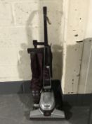 A vintage Kirby upright vacuum cleaner