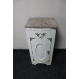 An antique painted pot cupboard with later marble top