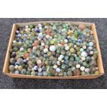 A box of vintage marbles