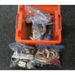A box containing six bags of assorted costume jewellery