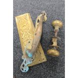 An antique brass Art Nouveau door handle,