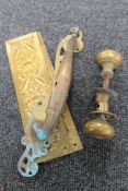 An antique brass Art Nouveau door handle,