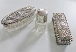 A silver embossed dressing table box,