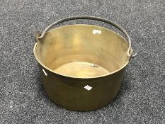 An antique brass jam pan