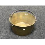 An antique brass jam pan