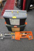 Two plastic tool boxes containing hand tools and hardware