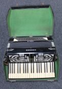 ** Lot withdrawn from auction ** A cased Hohner Verde III accordion