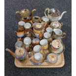 A tray of four Japanese tea services