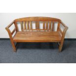 A teak garden bench