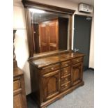 A Ducal Pine mirror backed sideboard,