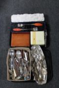 Two trays containing a large quantity of boxed and unboxed cutlery,