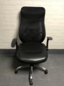 An RS Soho adjustable high back leather armchair