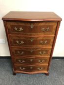 A reproduction continental ormolu mounted chest of five drawers,