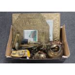 A box of two brass framed embossed mirrors, brass companion set, trivet,