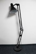 A black metal angle poise floor lamp (continental wiring)