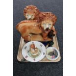 A tray of pair of Victorian Staffordshire lion figures, Hummel figure of a girl with chicks,
