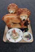 A tray of pair of Victorian Staffordshire lion figures, Hummel figure of a girl with chicks,