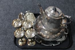 A tray of assorted 20th century plated wares including teapot, goblets, toast rack,