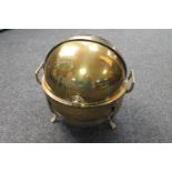 Four Indian brass dome topped food warmers on stands