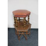 A hexagonal carved oak occasional table on barley twist legs together with a similar stool