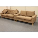 A three seater and two seater settee upholstered in brown suede fabric