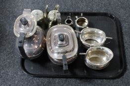 A tray containing a four piece Cross Arrows hard soldered plated tea service together with four