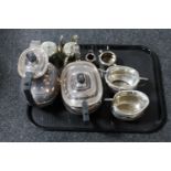 A tray containing a four piece Cross Arrows hard soldered plated tea service together with four