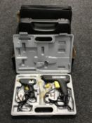 A cased soldering set and two cased glue guns