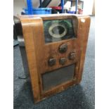 A walnut cased Art Deco valve radio by Invicta
