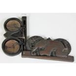 A set of 19th century opium scales in a carved hardwood case depicting an elephant