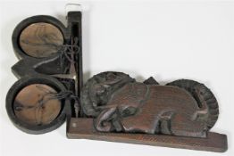 A set of 19th century opium scales in a carved hardwood case depicting an elephant