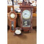 A Highlands 31 day wall clock together with a 31 day regulator clock and Comitti of London mantel