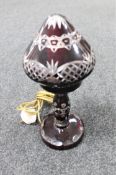 An early 20th century ruby cut glass table lamp with shade CONDITION REPORT: 36cm