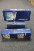 A boxed set of six Bohemian crystal wine glasses together with a further set of boxed Cristal