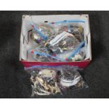 A box containing seven bags of assorted costume jewellery