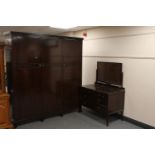 An Edwardian mahogany triple door wardrobe together with three drawer dressing chest