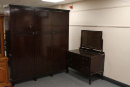 An Edwardian mahogany triple door wardrobe together with three drawer dressing chest