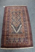 An old Baluchi rug 152 cm x 89 cm