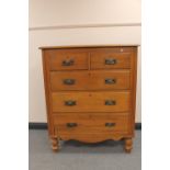 An Edwardian satinwood five drawer chest